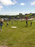  Kids playing footgolf at our dinosaur park, offering family days out in Wales