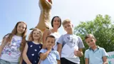 Happy kids and their mum at our theme park in South Wales