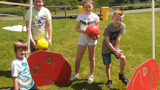 Smiling Kids playing footgolf at our outdoor theme park